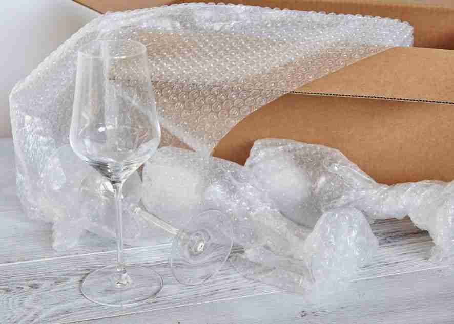 wine glasses protected with bubble wrap